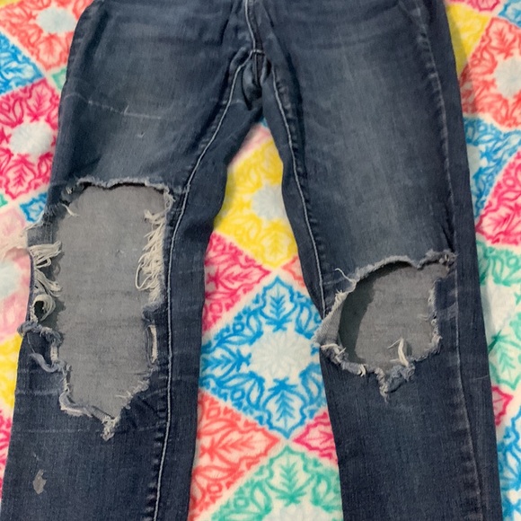Naturally distressed jeans. - Picture 4 of 5